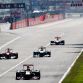 MONZA, ITALY - SEPTEMBER 11:  Sebastian Vettel (front) of Germany and Red Bull Racing leads from Fernando Alonso (L) of Spain and Ferrari and Michael Schumacher (R) of Germany and Mercedes GP and Lewis Hamilton (rear) of Great Britain and McLaren on his way to winning the Italian Formula One Grand Prix at the Autodromo Nazionale di Monza on September 11, 2011 in Monza, Italy.  (Photo by Paul Gilham/Getty Images)