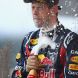 SUZUKA, JAPAN - OCTOBER 09:  Sebastian Vettel of Germany and Red Bull Racing celebrates on the podium after finishing third to secure his second F1 World Drivers Championship during the Japanese Formula One Grand Prix at Suzuka Circuit on October 9, 2011 in Suzuka, Japan.  (Photo by Clive Mason/Getty Images)