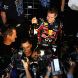 SUZUKA, JAPAN - OCTOBER 09:  Sebastian Vettel of Germany and Red Bull Racing celebrates with team mates in the pitlane after finishing third to secure his second F1 World Drivers Championship during the Japanese Formula One Grand Prix at Suzuka Circuit on October 9, 2011 in Suzuka, Japan.  (Photo by Clive Mason/Getty Images)
