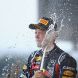 SUZUKA, JAPAN - OCTOBER 09:  Sebastian Vettel of Germany and Red Bull Racing celebrates on the podium after finishing third to secure his second F1 World Drivers Championship during the Japanese Formula One Grand Prix at Suzuka Circuit on October 9, 2011 in Suzuka, Japan.  (Photo by Clive Mason/Getty Images)