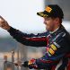 SUZUKA, JAPAN - OCTOBER 09:  Sebastian Vettel of Germany and Red Bull Racing celebrates on the podium after finishing third to secure his second F1 World Drivers Championship during the Japanese Formula One Grand Prix at Suzuka Circuit on October 9, 2011 in Suzuka, Japan.  (Photo by Clive Mason/Getty Images)