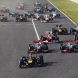 SUZUKA, JAPAN - OCTOBER 09:  Sebastian Vettel of Germany and Red Bull Racing leads the field towards the first corner at the start of the Japanese Formula One Grand Prix at Suzuka Circuit on October 9, 2011 in Suzuka, Japan.  (Photo by Mark Thompson/Getty Images)