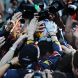 SUZUKA, JAPAN - OCTOBER 09:  Sebastian Vettel of Germany and Red Bull Racing celebrates with team mates after finishing third to secure his second F1 World Drivers Championship during the Japanese Formula One Grand Prix at Suzuka Circuit on October 9, 2011 in Suzuka, Japan.  (Photo by Mark Thompson/Getty Images)