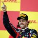 SUZUKA, JAPAN - OCTOBER 09:  Sebastian Vettel of Germany and Red Bull Racing celebrates on the podium after finishing third to secure his second F1 World Drivers Championship during the Japanese Formula One Grand Prix at Suzuka Circuit on October 9, 2011 in Suzuka, Japan.  (Photo by Clive Rose/Getty Images)