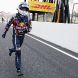 SUZUKA, JAPAN - OCTOBER 09:  Sebastian Vettel of Germany and Red Bull Racing runs down the pitlane to celebrate with his team mates after finishing third to secure his second F1 World Drivers Championship during the Japanese Formula One Grand Prix at Suzuka Circuit on October 9, 2011 in Suzuka, Japan.  (Photo by Ker Robertson/Getty Images)