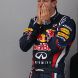 SUZUKA, JAPAN - OCTOBER 09:  Sebastian Vettel of Germany and Red Bull Racing celebrates on the podium after finishing third to secure his second F1 World Drivers Championship during the Japanese Formula One Grand Prix at Suzuka Circuit on October 9, 2011 in Suzuka, Japan.  (Photo by Clive Mason/Getty Images)