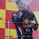 SUZUKA, JAPAN - OCTOBER 09:  Sebastian Vettel of Germany and Red Bull Racing celebrates on the podium after finishing third to secure his second F1 World Drivers Championship during the Japanese Formula One Grand Prix at Suzuka Circuit on October 9, 2011 in Suzuka, Japan.  (Photo by Mark Thompson/Getty Images)