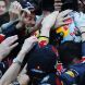 SUZUKA, JAPAN - OCTOBER 09:  Sebastian Vettel of Germany and Red Bull Racing celebrates with team mates after finishing third to secure his second F1 World Drivers Championship during the Japanese Formula One Grand Prix at Suzuka Circuit on October 9, 2011 in Suzuka, Japan.  (Photo by Mark Thompson/Getty Images)