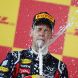 SUZUKA, JAPAN - OCTOBER 09:  Sebastian Vettel of Germany and Red Bull Racing celebrates on the podium after finishing third to secure his second F1 World Drivers Championship during the Japanese Formula One Grand Prix at Suzuka Circuit on October 9, 2011 in Suzuka, Japan.  (Photo by Clive Rose/Getty Images)