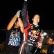 SUZUKA, JAPAN - OCTOBER 09:  Sebastian Vettel of Germany and Red Bull Racing celebrates with team mates in the pitlane after finishing third to secure his second F1 World Drivers Championship during the Japanese Formula One Grand Prix at Suzuka Circuit on October 9, 2011 in Suzuka, Japan.  (Photo by Clive Rose/Getty Images)