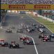 SUZUKA, JAPAN - OCTOBER 09:  Sebastian Vettel (2nd left) of Germany and Red Bull Racing leads from Jenson Button (left) of Great Britain and McLaren towards the first corner at the start of the Japanese Formula One Grand Prix at Suzuka Circuit on October 9, 2011 in Suzuka, Japan.  (Photo by Mark Thompson/Getty Images)