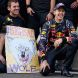 YEONGAM-GUN, SOUTH KOREA - OCTOBER 16:  Sebastian Vettel of Germany and Red Bull Racing celebrates with team mates as they win the Constructors title following his victory in the Korean Formula One Grand Prix at the Korea International Circuit on October 16, 2011 in Yeongam-gun, South Korea.  (Photo by Clive Mason/Getty Images)