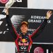 YEONGAM-GUN, SOUTH KOREA - OCTOBER 16:  Sebastian Vettel of Germany and Red Bull Racing celebrates on the podium after winning the Korean Formula One Grand Prix at the Korea International Circuit on October 16, 2011 in Yeongam-gun, South Korea.  (Photo by Mark Thompson/Getty Images)
