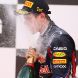 YEONGAM-GUN, SOUTH KOREA - OCTOBER 16:  Sebastian Vettel of Germany and Red Bull Racing celebrates on the podium after winning the Korean Formula One Grand Prix at the Korea International Circuit on October 16, 2011 in Yeongam-gun, South Korea.  (Photo by Clive Mason/Getty Images)