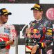 YEONGAM-GUN, SOUTH KOREA - OCTOBER 16:  Race winner Sebastian Vettel (R) of Germany and Red Bull Racing celebrates on the podium with second placed Lewis Hamilton (L) of Great Britain and McLaren following the Korean Formula One Grand Prix at the Korea International Circuit on October 16, 2011 in Yeongam-gun, South Korea.  (Photo by Clive Mason/Getty Images)