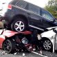 VW Touareg crashed in Tesla Roadster and Toyota Prius