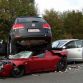VW Touareg crashed in Tesla Roadster and Toyota Prius