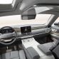 A two- tone leather wrapped steering wheel and through center console compliment the modern, uncluttered interior design.