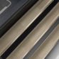 Illuminated power running boards and concertina steps guide your entry.