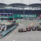 KUALA LUMPUR, MALAYSIA - APRIL 10:  Sebastian Vettel  (left) of Germany and Red Bull Racing leads from the field at the start of the Malaysian Formula One Grand Prix at the Sepang Circuit on April 10, 2011 in Kuala Lumpur, Malaysia.  (Photo by Clive Mason/Getty Images)