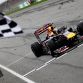 KUALA LUMPUR, MALAYSIA - APRIL 10:  Sebastian Vettel of Germany and Red Bull Racing celebrates as he crosses the finishing line to win the Malaysian Formula One Grand Prix at the Sepang Circuit on April 10, 2011 in Kuala Lumpur, Malaysia.  (Photo by Paul Gilham/Getty Images)