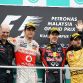 KUALA LUMPUR, MALAYSIA - APRIL 10:  Race winner Sebastian Vettel (2nd right) of Germany and Red Bull Racing celebrates with second placed Jenson Button (2nd left) of Great Britain and McLaren, third placed Nick Heidfeld (right) of Germany and Renault and Red Bull Racing Chief Technical Officer Adrian Newey (left) on the podium after the Malaysian Formula One Grand Prix at the Sepang Circuit on April 10, 2011 in Kuala Lumpur, Malaysia.  (Photo by Paul Gilham/Getty Images)