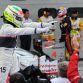 Sauber-Ferrari driver Sergio Perez of Mexico celebrates after placing second in Formula One\'s Malaysian Grand Prix at the Sepang International Circuit in Sepang on March 25, 2012  AFP PHOTO / ROSLAN RAHMAN (Photo credit should read ROSLAN RAHMAN/AFP/Getty Images)