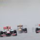 McLaren-Mercedes driver Lewis Hamilton (2ndL) of Britain leads during the start of Formula One\'s Malaysian Grand Prix at the Sepang International Circuit in Sepang on March 25, 2012  AFP PHOTO / ROSLAN RAHMAN (Photo credit should read ROSLAN RAHMAN/AFP/Getty Images)