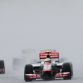 McLaren-Mercedes driver Lewis Hamilton of Britain (C) takes the lead during Formula One\'s Malaysian Grand Prix at the Sepang International Circuit in Sepang on March 25, 2012.    AFP PHOTO / ROSLAN RAHMAN (Photo credit should read ROSLAN RAHMAN/AFP/Getty Images)