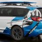 Custom Mopar graphics are wrapped on the quarter panel and rear of the white exterior of the Chrysler Pacifica Cadence, expressing the vehicle’s active lifestyle, paddle boarding theme