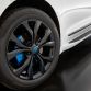 Production Mopar 20-inch wheels on the Chrysler Pacifica Cadence are tri-color, tinted in Satin Black and Gloss Black tones with a Mopar blue accent on a single wheel pocket. The center cap is customized with a Mopar blue “Omega M” logo.