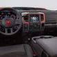 The Macho Mango exterior color of the Ram Macho Power Wagon also brightens the interior, accenting the steering wheel Ram logo and the trim on the gauges, HVAC, infotainment center and side door panels.