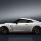 The 2017 Nissan GT-R NISMO’s front end features a freshened face highlighted by an aggressive new fascia. To help cool the car’s high-output engine, the dark chrome “V-motion” grille has been enlarged to collect more air, without diminishing the car’s aerodynamic performance. A new significantly reinforced hood avoids deformation at extremely high speeds, allowing it to keep its aerodynamic shape. Unlike the standard model, the front bumper of the GT-R NISMO – crafted with Takumi-like precision – feature layers of carbon-fiber sheets carefully overlapped to achieve the ideal amount of stiffness.