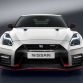 The 2017 Nissan GT-R NISMO’s front end features a freshened face highlighted by an aggressive new fascia. To help cool the car’s high-output engine, the dark chrome “V-motion” grille has been enlarged to collect more air, without diminishing the car’s aerodynamic performance. A new significantly reinforced hood avoids deformation at extremely high speeds, allowing it to keep its aerodynamic shape. Unlike the standard model, the front bumper of the GT-R NISMO – crafted with Takumi-like precision – feature layers of carbon-fiber sheets carefully overlapped to achieve the ideal amount of stiffness.