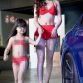 Outcry over young bikini-clad girl models at car show