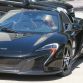 Paris Hilton and her McLaren 650S Spider