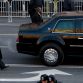 WASHINGTON - JANUARY 20: President Barack Obama waves from the window of his limousine while riding in the Inaugural Parade down Pennsylvania Avenue on January 20, 2009 in Washington, DC. Obama was sworn in as the 44th President of the United States, becoming the first African American to be elected President of the US.  (Photo by Brendan Hoffman/Getty Images)