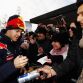 135534278KR015_Red_Bull_RacMILTON KEYNES, ENGLAND - DECEMBER 10: Sebastian Vettel of Germany and Red Bull Racing signs autographs for fans while attending the Red Bull Racing Home Run event on December 10, 2011 in Milton Keynes, England.  (Photo by Mark Thompson/Getty Images for Red Bull)