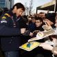 MILTON KEYNES, ENGLAND - DECEMBER 10:  Mark Webber of Australia and Red Bull Racing signs autographs for fans during the Red Bull Racing Home Run event on December 10, 2011 in Milton Keynes, England.  (Photo by Mark Thompson/Getty Images for Red Bull)