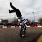 MILTON KEYNES, ENGLAND - DECEMBER 10:  Stunt motorcycle expert Chris Pfeiffer performs for the crowd while attending the Red Bull Racing Home Run event on December 10, 2011 in Milton Keynes, England.  (Photo by Richard Heathcote/Getty Images for Red Bull)
