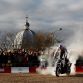 MILTON KEYNES, ENGLAND - DECEMBER 10:  Stunt motorcycle expert Chris Pfeiffer performs for the crowd while attending the Red Bull Racing Home Run event on December 10, 2011 in Milton Keynes, England.  (Photo by Richard Heathcote/Getty Images for Red Bull)