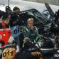 Former Formula One pilot Heikki Kovalainen leaves his Audi R8, after a crash into the wall during the Race of Champions (ROC) at the \'Esprit-Arena\'  in Duesseldorf, November 28, 2010.  REUTERS/Ina Fassbender (GERMANY - Tags: SPORT MOTOR RACING)