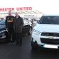Sir Alex Ferguson and Sir Bobby Charlton with their new cars...