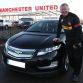 Sir Alex Ferguson with his Chevrolet Volt