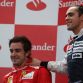 Circuit de Catalunya, Barcelona, Spain13th May 2012Pastor Maldonado, Williams F1 Team celebrates on the podium with Fernando Alonso, Ferrari after winning the race.World Copyright:Lorenzo Bellanca/LAT Photographicref: Digital Image GU5G8258