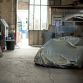 Supecars in a dusty French barn