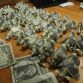 Ticket paid with 137 origami pigs dollars