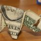 Ticket paid with 137 origami pigs dollars