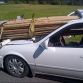 Woman survives crash as dozens of poles pierce through windshield