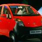 The new Tata "Nano" car is pictured during the launch in New Delhi, 10 January 2008.  India's giant Tata Group unveiled a USD 2,500 car it bills as the world's cheapest amid predictions the compact, no-frills vehicle could revolutionise how the nation of 1.1 billion people travels.   AFP PHOTO/RAVEENDRAN (Photo credit should read RAVEENDRAN/AFP/Getty Images)